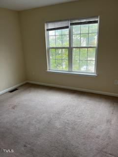 3622 Brideveil Court Raleigh, NC 27610 - Photo 8 of 12 an empty room with a window