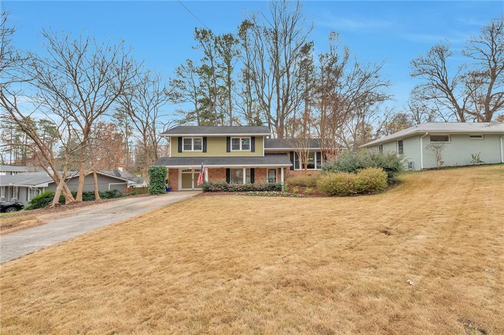1210 Pinehurst Circle Smyrna, GA 30080 - Photo 1 of 1 a front view of a house with a yard