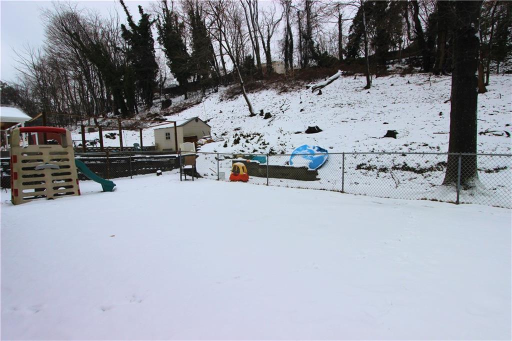 3941 Middleboro Road Castle Shannon, PA 15234 - Photo 19 of 23 level fenced in rear yard.