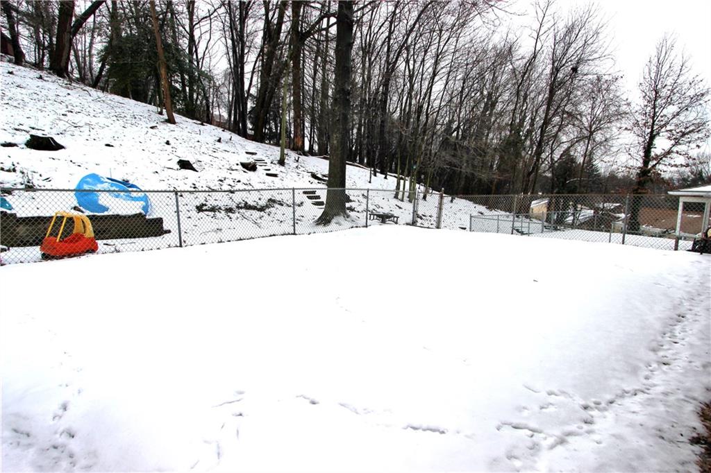 3941 Middleboro Road Castle Shannon, PA 15234 - Photo 21 of 23 Property goes past fence and up the hill