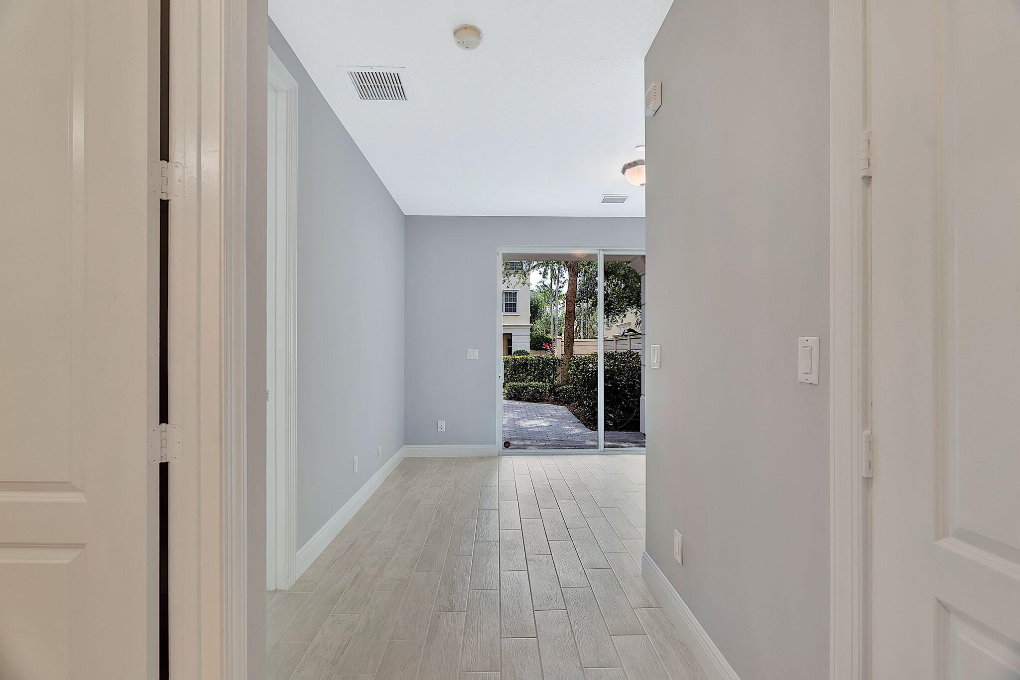 5570 Northeast Trieste Terrace Boca Raton, FL 33487 - Photo 4 of 39 Hallway 1st floor
