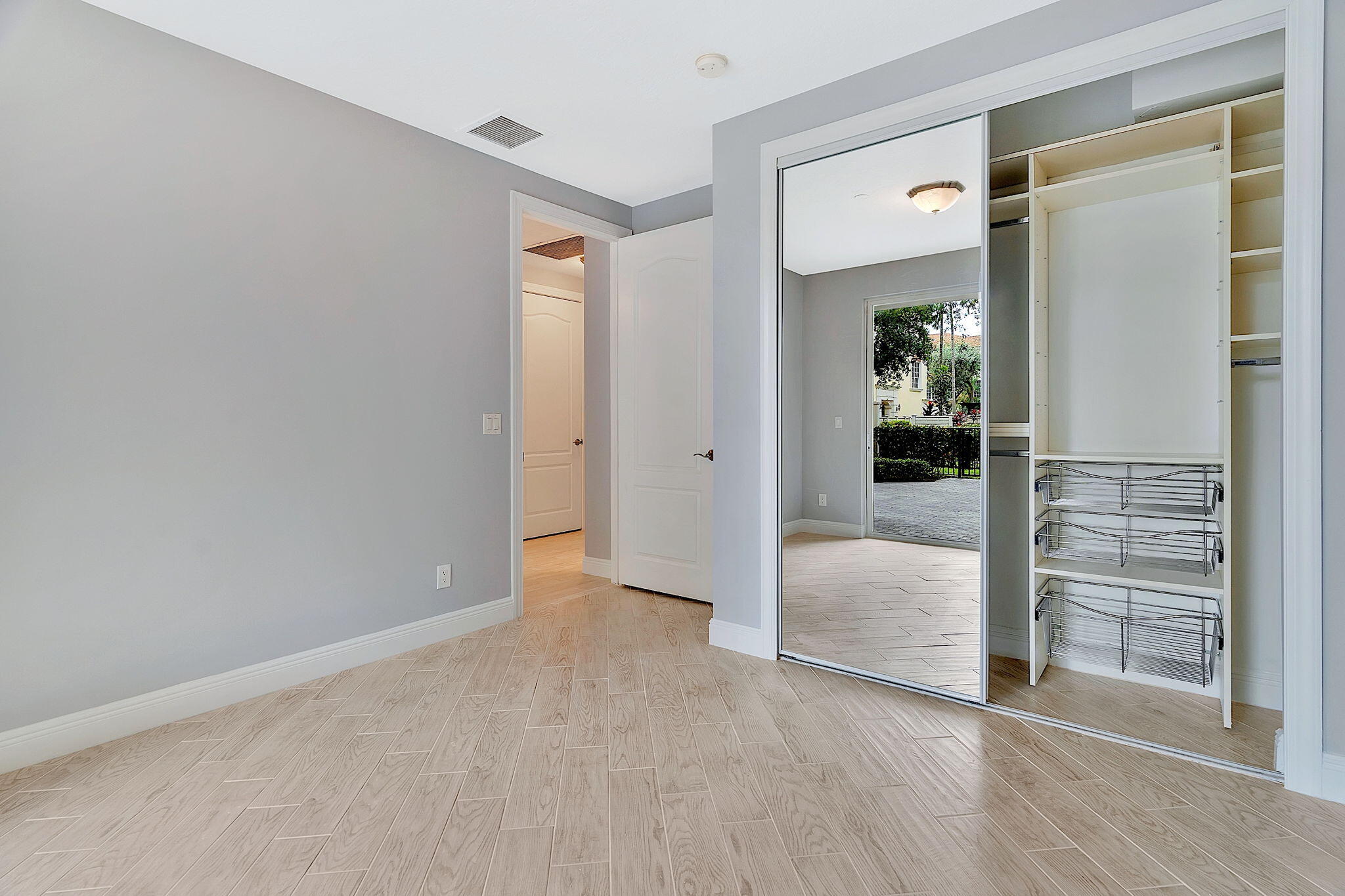 5570 Northeast Trieste Terrace Boca Raton, FL 33487 - Photo 9 of 39 Bedroom 4 1st floor closet