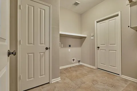 a house with river in front of it