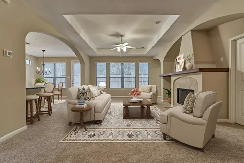 a view of a dining room with furniture and window