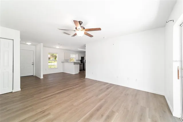 a kitchen with stainless steel appliances granite countertop a stove oven and a refrigerator