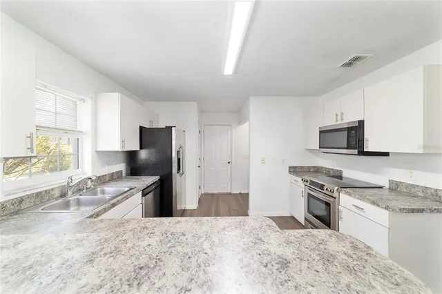 a bathroom with a sink and a bathtub