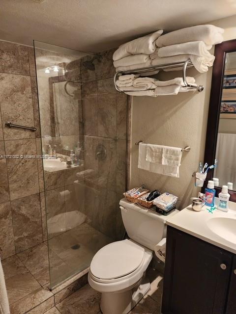 17911 Northwest 68th Avenue, Unit M104 Hialeah, FL 33015 - Photo 4 of 16 a bathroom with a sink toilet and shower