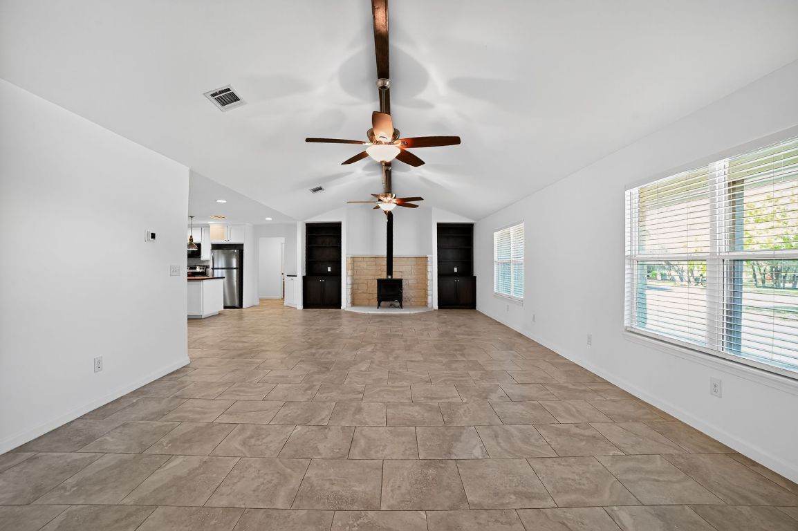 313 Starview Drive Georgetown, TX 78628 - Photo 2 of 38 a view of an empty room with a window