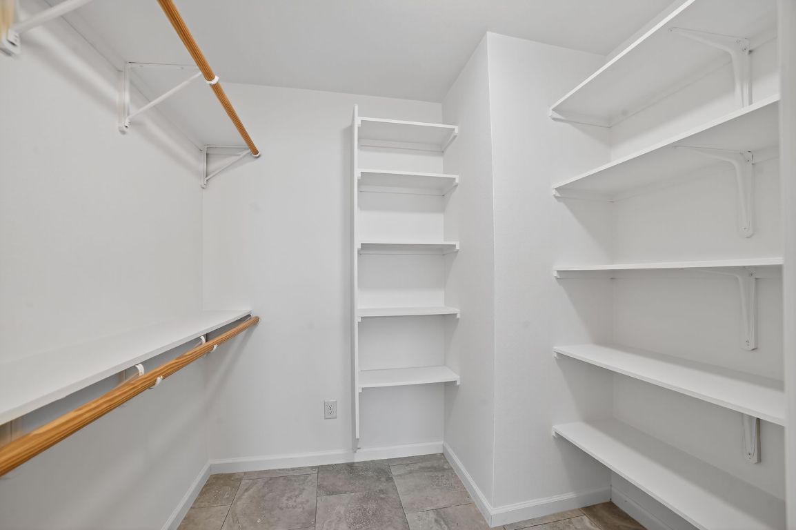 313 Starview Drive Georgetown, TX 78628 - Photo 23 of 38 a view of an empty walk in closet