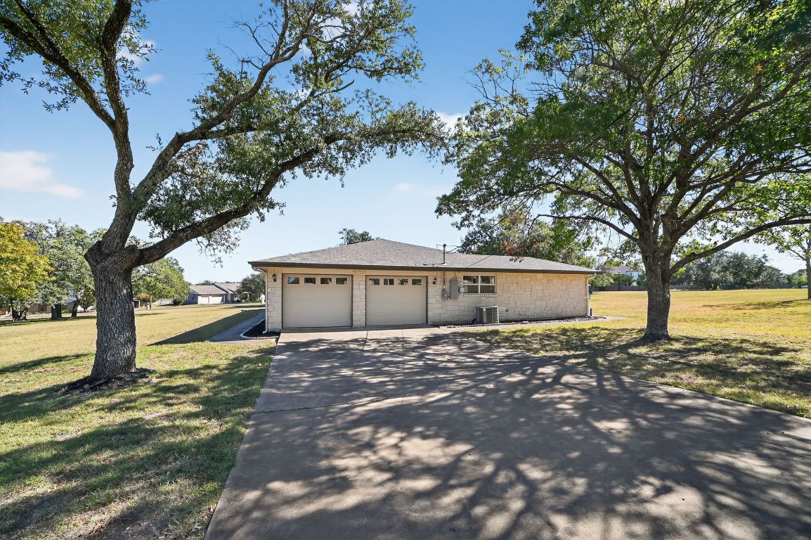 313 Starview Drive Georgetown, TX 78628 - Photo 4 of 38 a view of a house with a yard