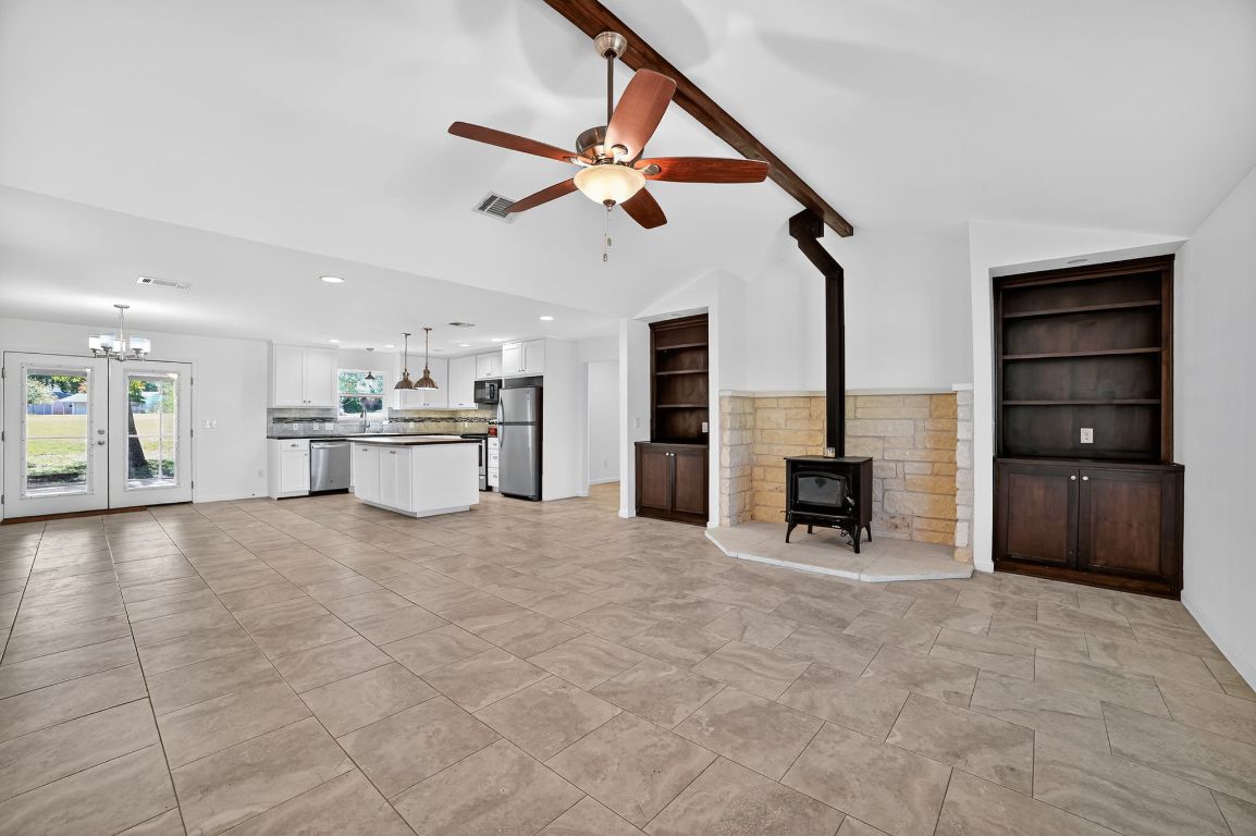313 Starview Drive Georgetown, TX 78628 - Photo 8 of 38 a view of an empty room with cabinet and windows