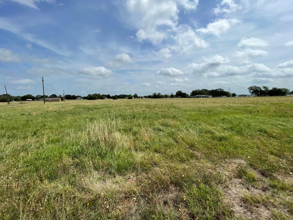 Lot #760 Seven Ranch Road Trinidad, TX 75163 - Photo 1 of 3 a view of a field with an trees