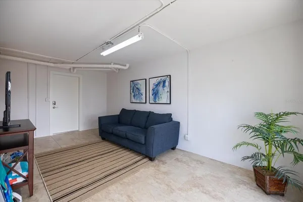 a view of a balcony with wooden floor and outdoor space