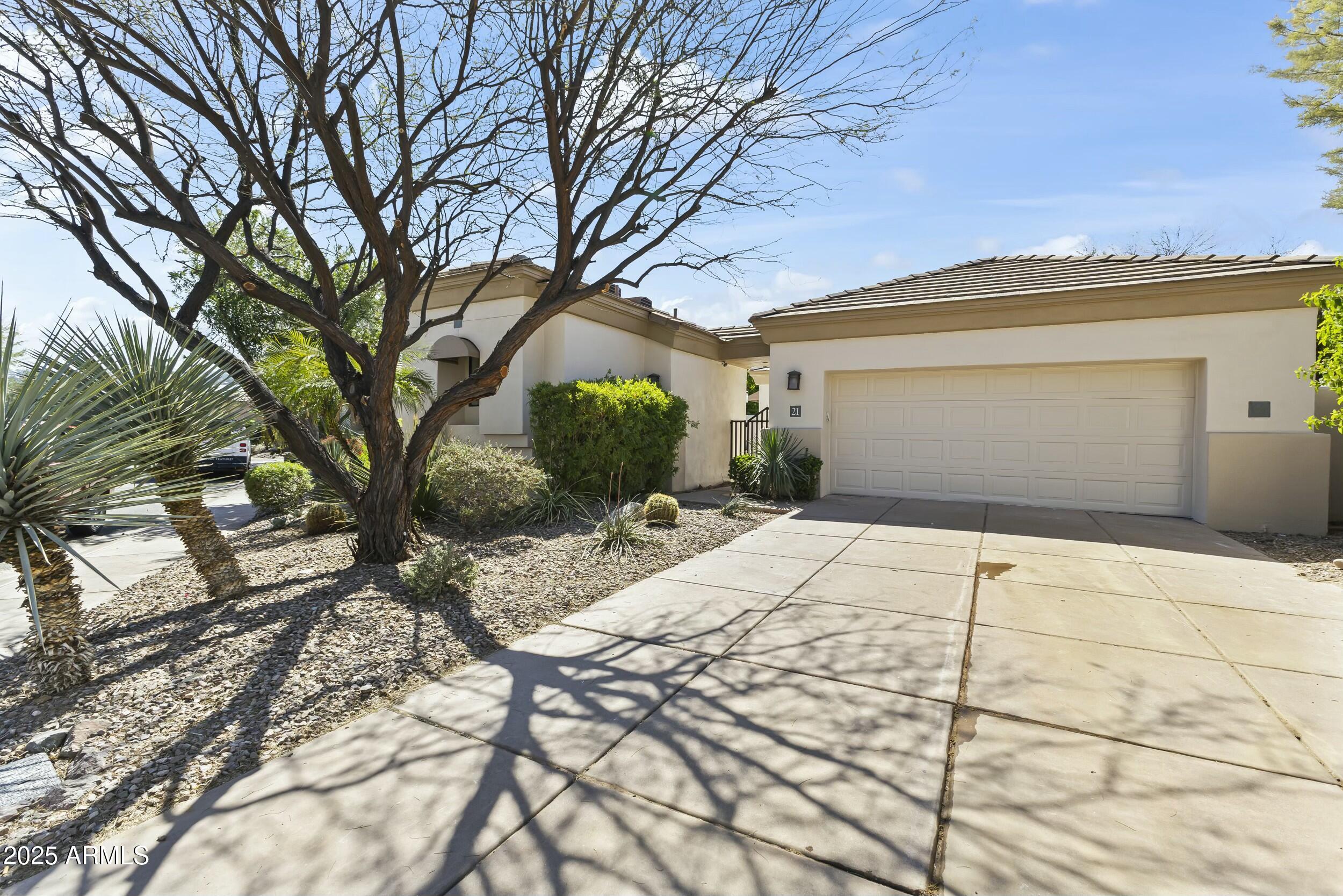 a view of a backyard of the house