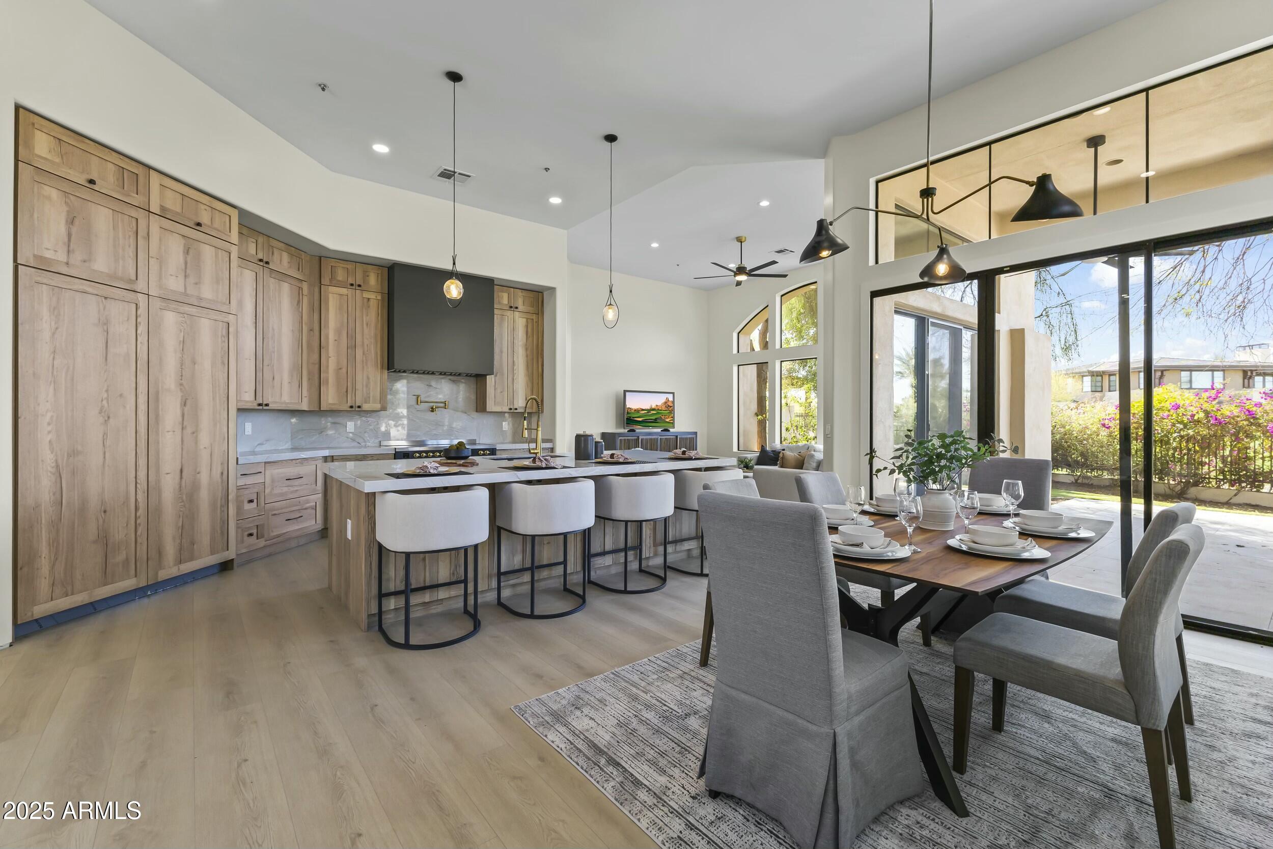 7705 East Doubletree Ranch Road, Unit 21 Scottsdale, AZ 85258 - Photo 13 of 45 a view of a dining room with furniture window and outside view