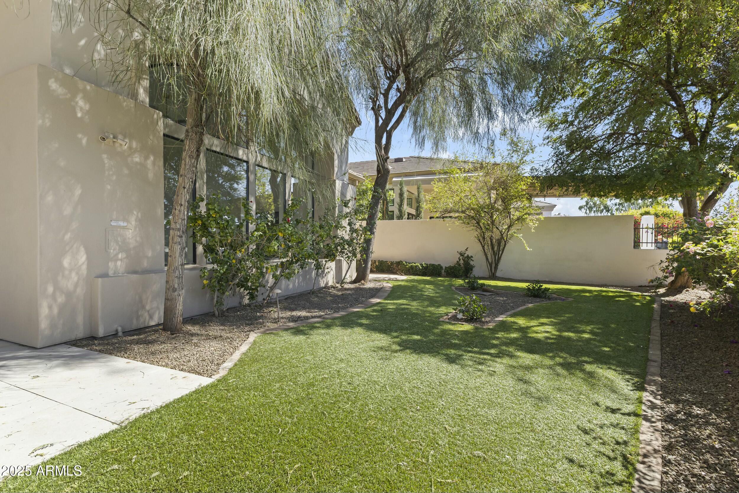 7705 East Doubletree Ranch Road, Unit 21 Scottsdale, AZ 85258 - Photo 31 of 45 a view of a backyard