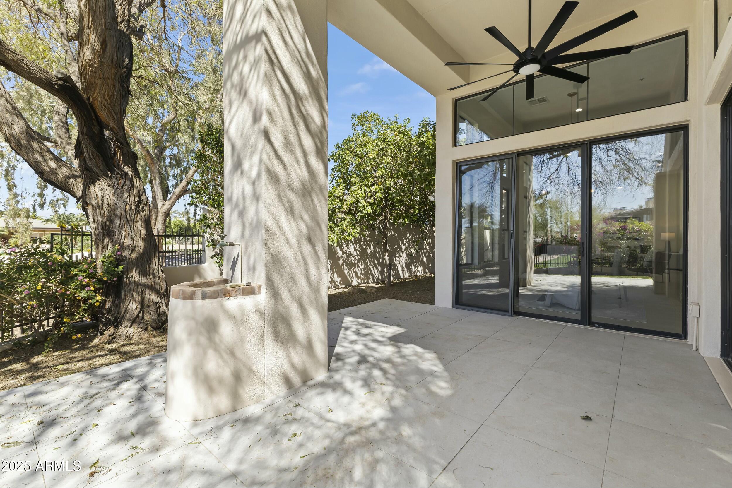 7705 East Doubletree Ranch Road, Unit 21 Scottsdale, AZ 85258 - Photo 32 of 45 a view of a house with a backyard