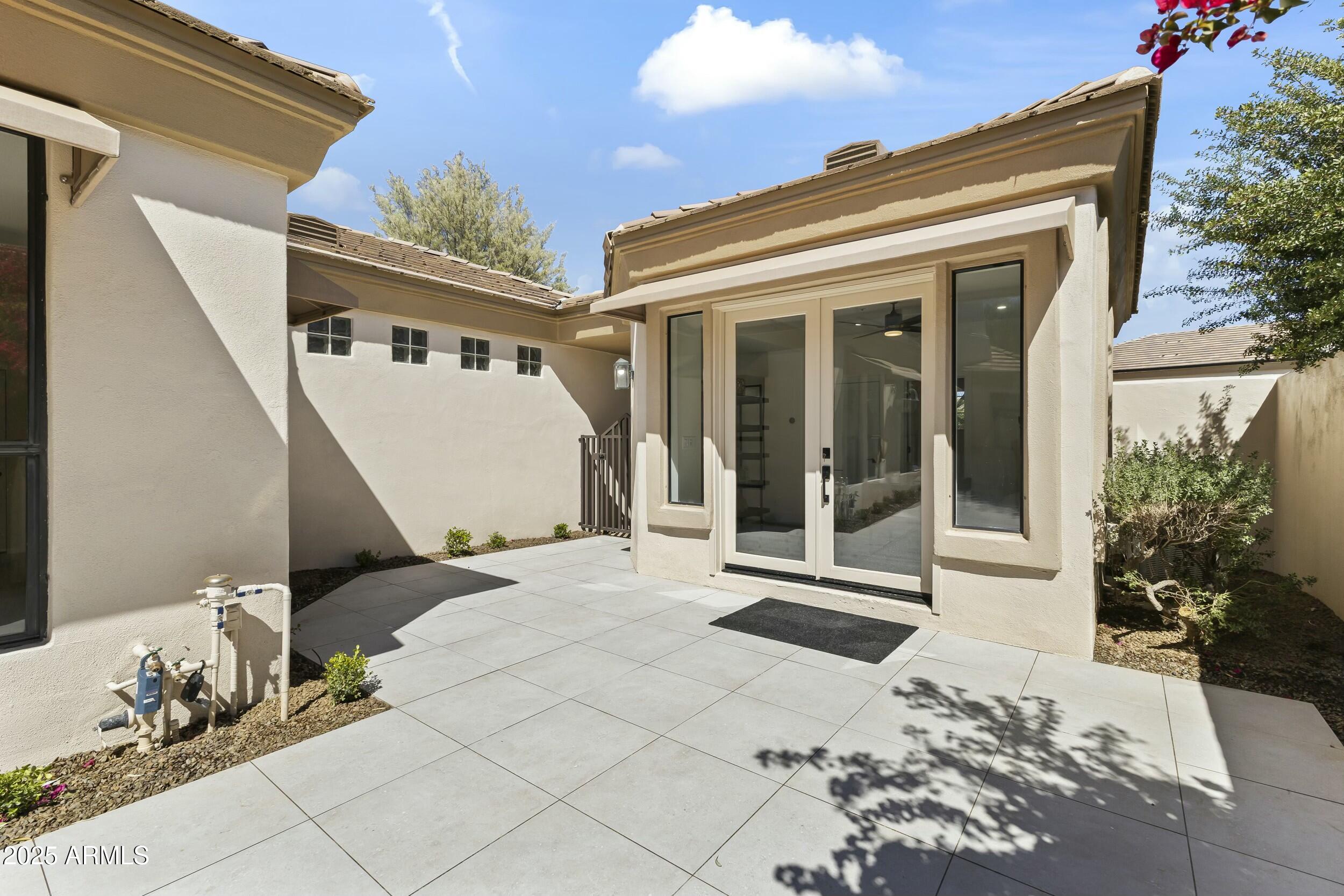 7705 East Doubletree Ranch Road, Unit 21 Scottsdale, AZ 85258 - Photo 35 of 45 a view of a white house