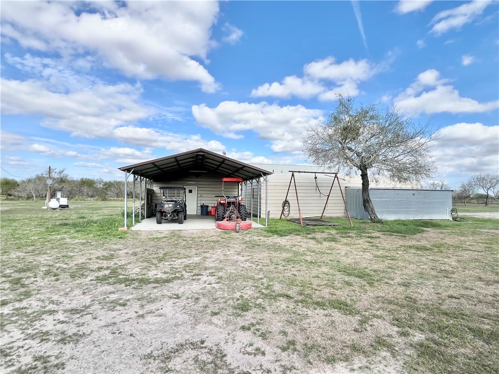 153 Boenig Road Woodsboro, TX 78393 - Photo 29 of 33 Tractor barn w/storage room