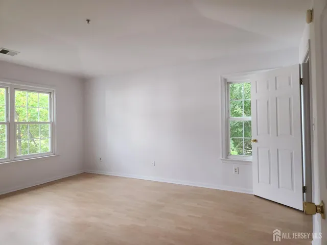 an empty room with windows