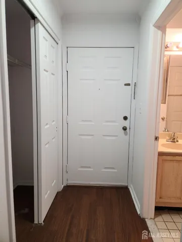 a view of empty room with closet area