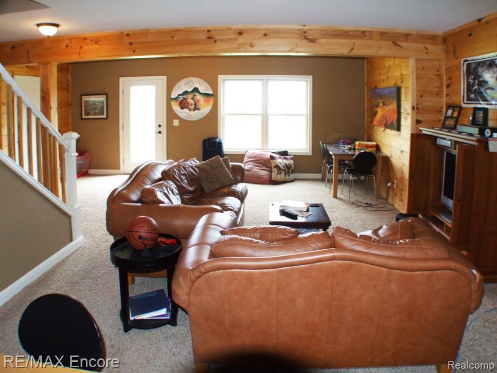 8363 Henderson Road Goodrich, MI 48438 - Photo 24 of 44 Family room in lower level walk-out