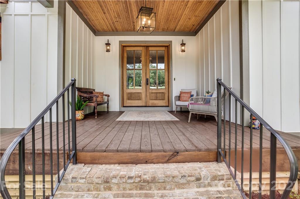 8080 Stillwater Drive Denver, NC 28037 - Photo 2 of 44 a living room with furniture and a wooden floor