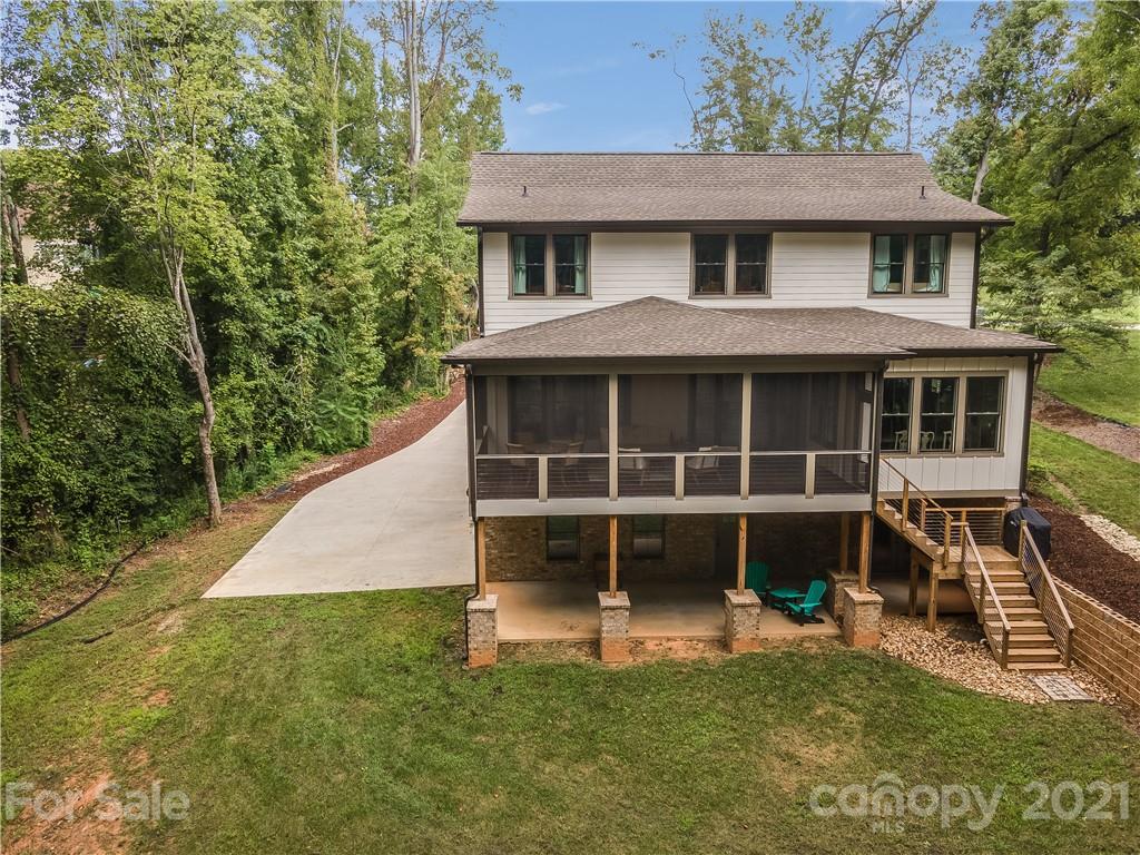 8080 Stillwater Drive Denver, NC 28037 - Photo 36 of 44 a house view with a garden space