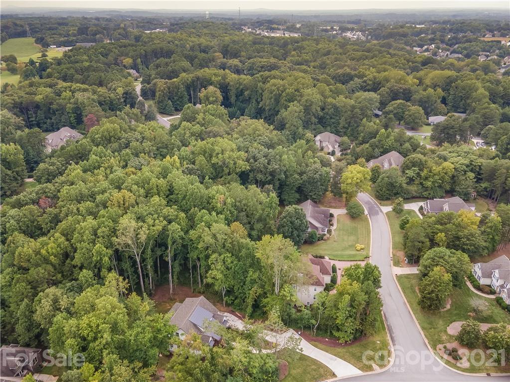 8080 Stillwater Drive Denver, NC 28037 - Photo 42 of 44 an aerial view of a city with lots of residential buildings
