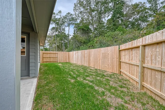 a view of backyard with green space