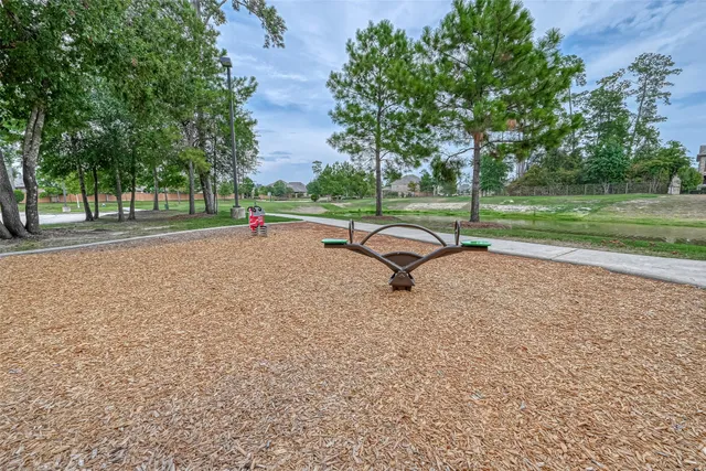 a view of park with trees