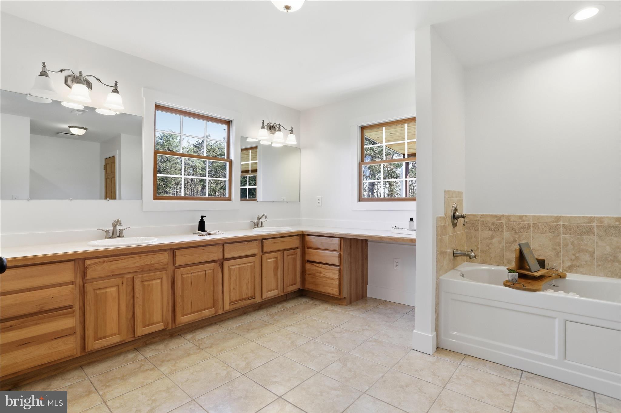 604 Locksa Road Romney, WV 26757 - Photo 28 of 48 Primary bathroom has a tub and shower