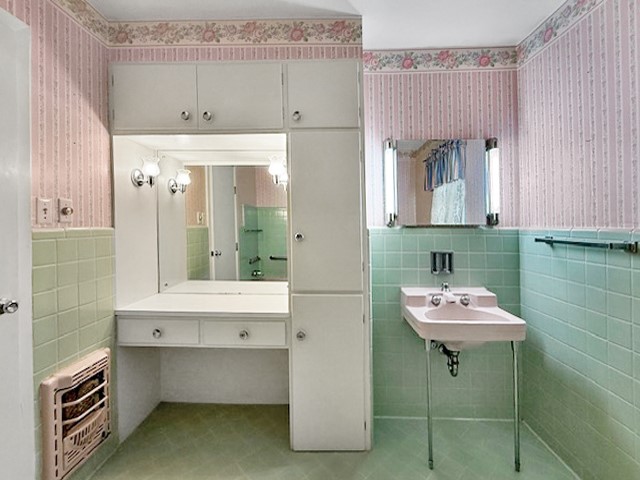 412 Neal Street Jasper, TX 75951 - Photo 15 of 22 a bathroom with a sink a toilet and a mirror