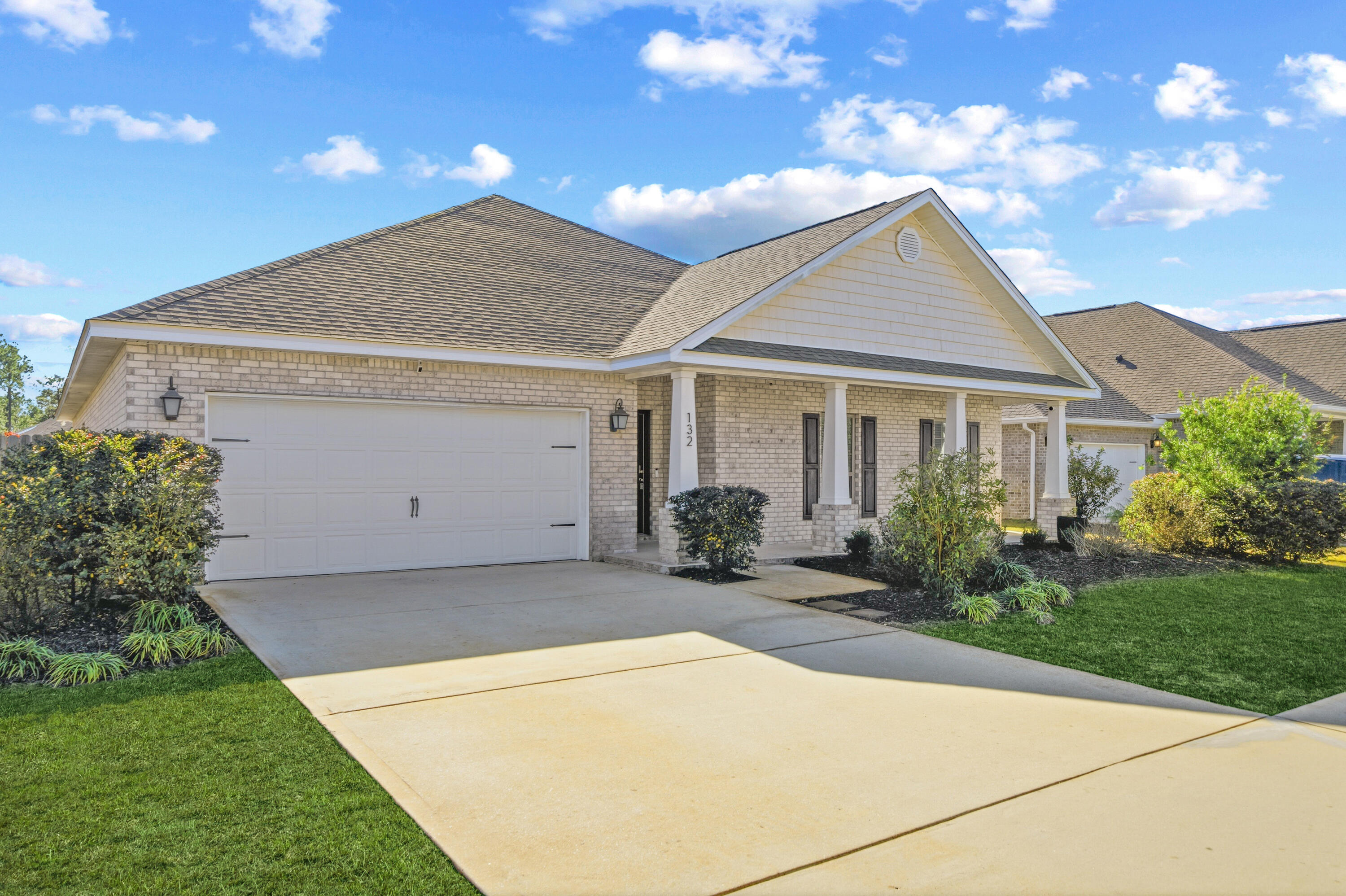 132 Wayne Trail Santa Rosa Beach, FL 32459 - Photo 2 of 43 a view of a house with a yard