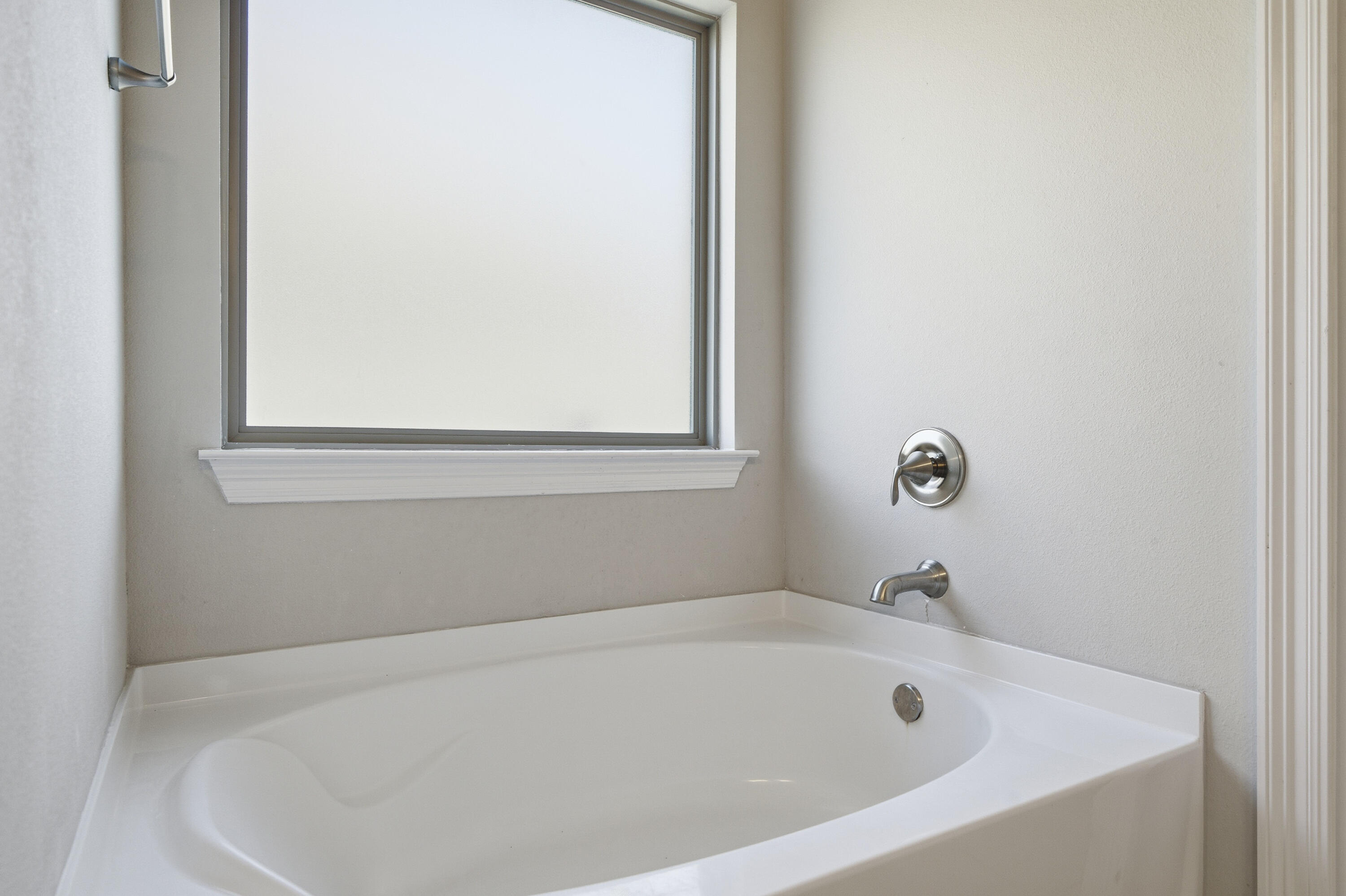 132 Wayne Trail Santa Rosa Beach, FL 32459 - Photo 23 of 43 a white bath tub sitting next to a window