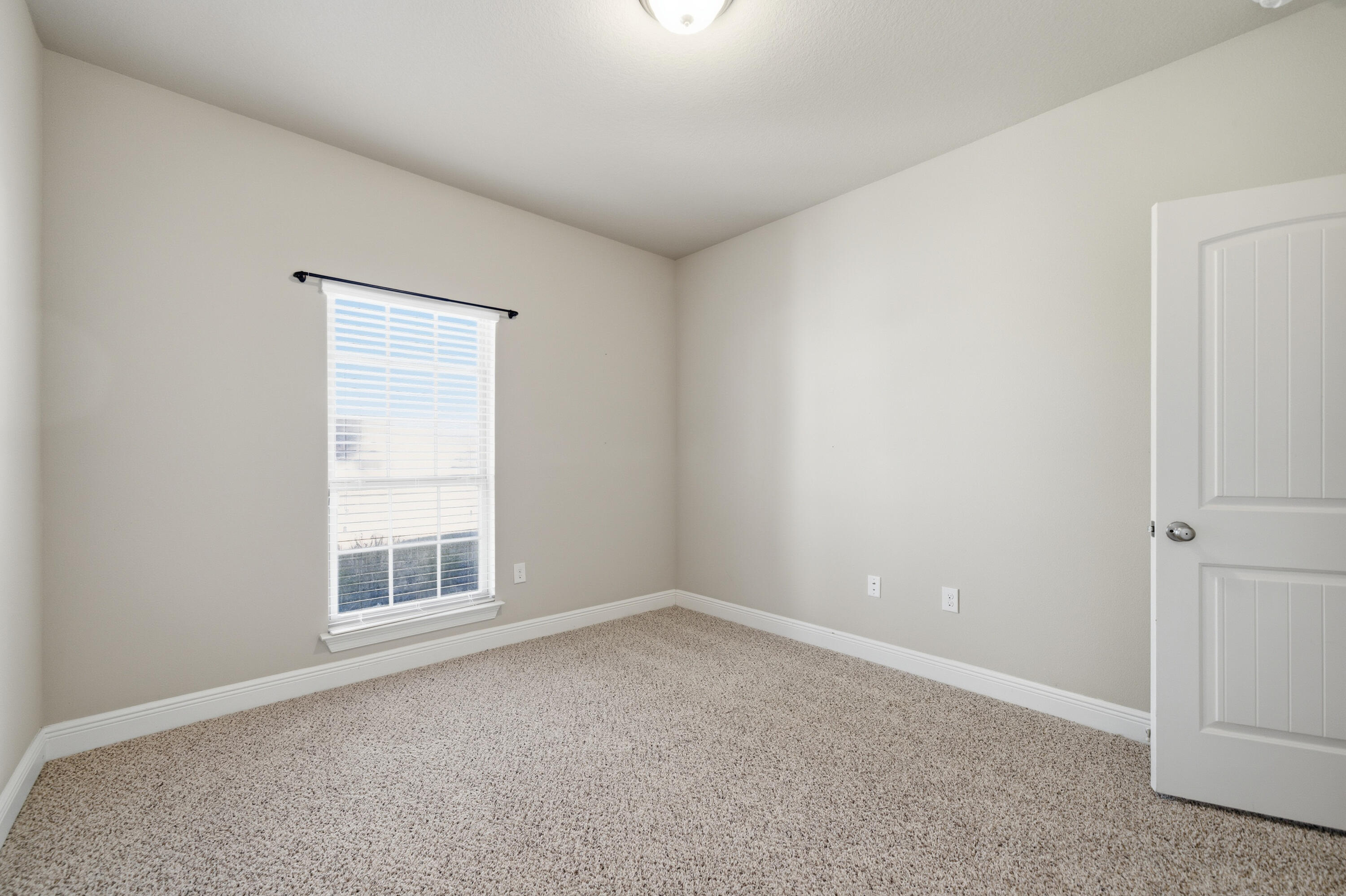 132 Wayne Trail Santa Rosa Beach, FL 32459 - Photo 29 of 43 an empty room with windows