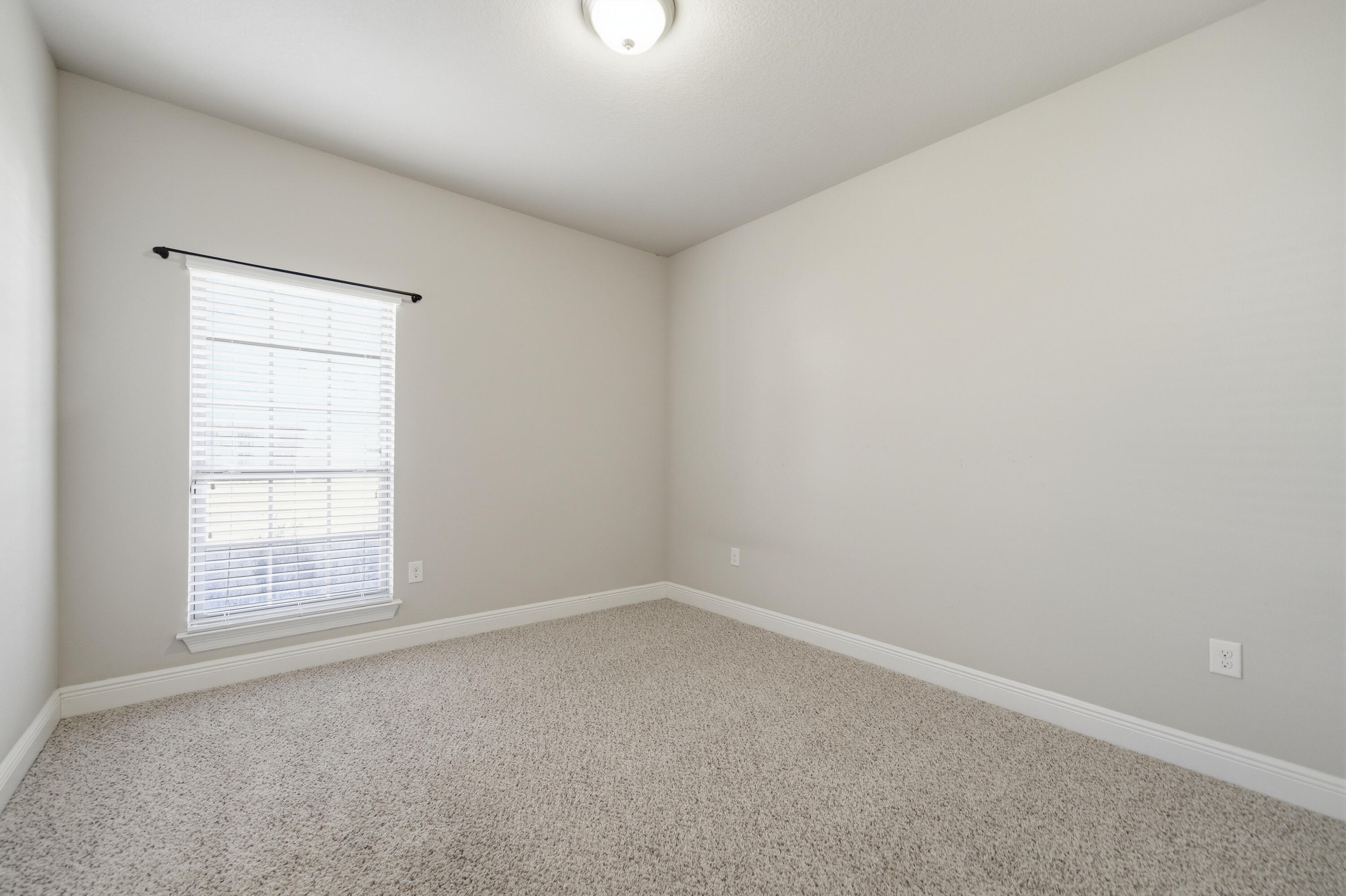 132 Wayne Trail Santa Rosa Beach, FL 32459 - Photo 33 of 43 an empty room with a window
