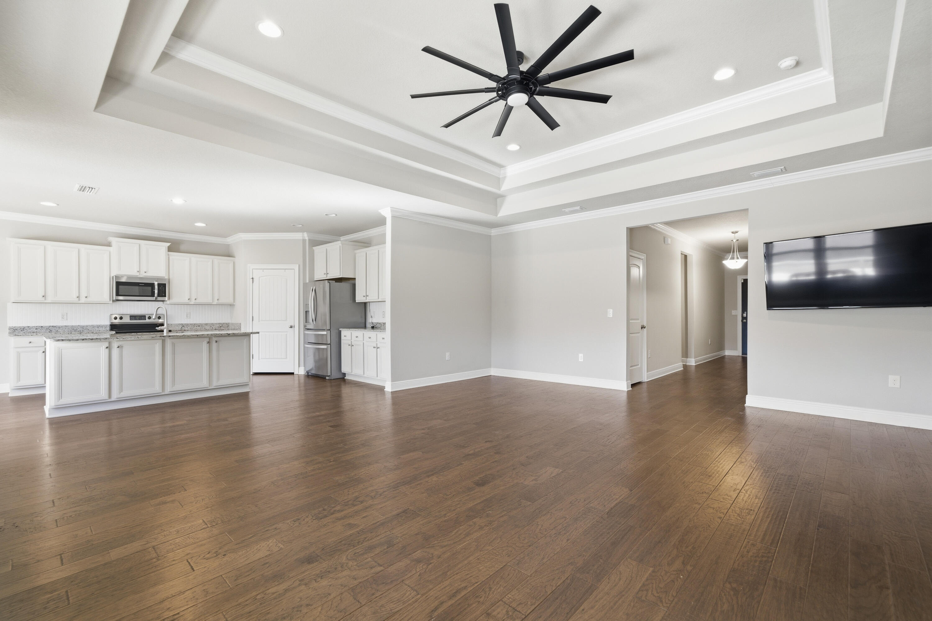 132 Wayne Trail Santa Rosa Beach, FL 32459 - Photo 10 of 43 a view of a kitchen with a sink and a refrigerator