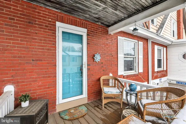 a front view of a house with parking space