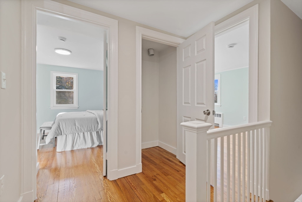 6 Puritan Lane Dedham, MA 02026 - Photo 24 of 41 a view of a room with wooden floor and a bathroom