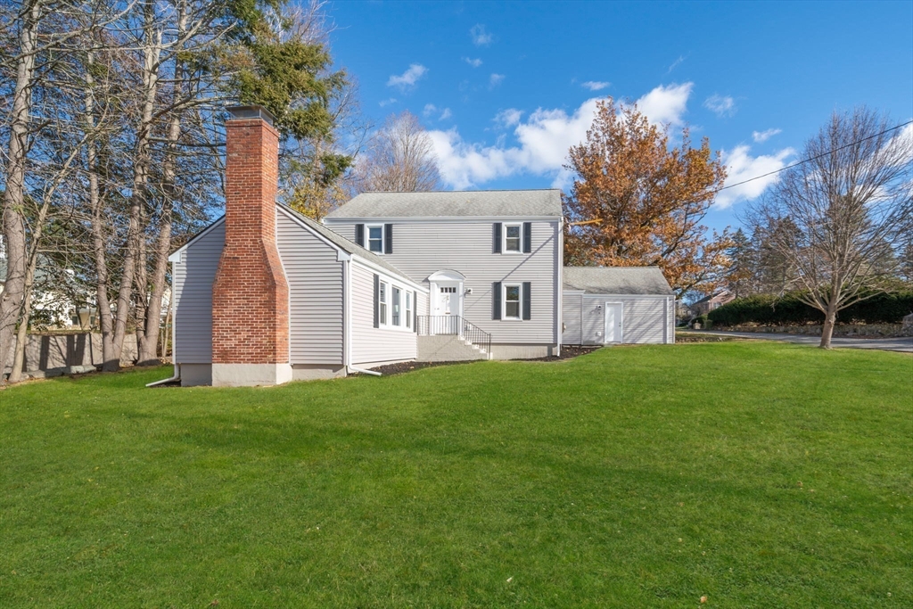 6 Puritan Lane Dedham, MA 02026 - Photo 37 of 41 a view of a house with a yard