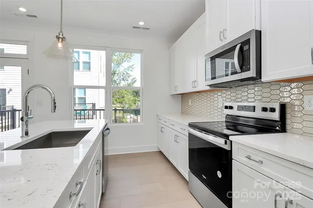 a view of a balcony with wooden floor