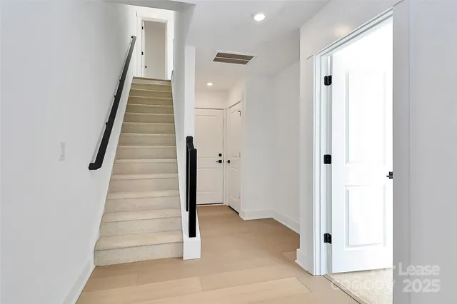 a view of an entryway with hallway
