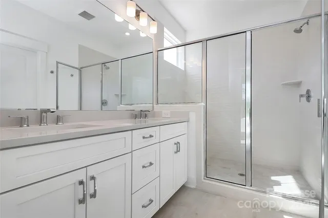 a view of a hallway with stairs