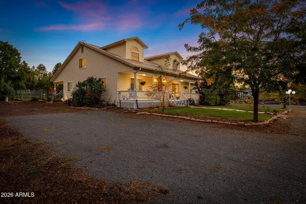 a view of a house with a street