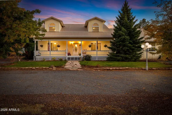 a picture of a bathroom with a shower curtain