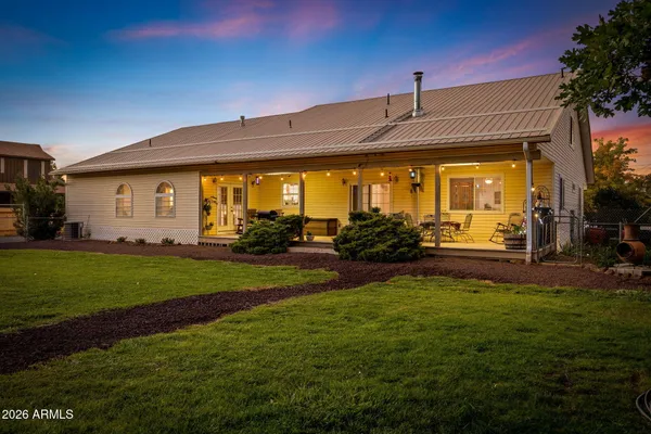 a view of a house with a street