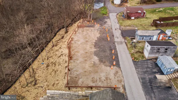 a view of swimming pool with a yard