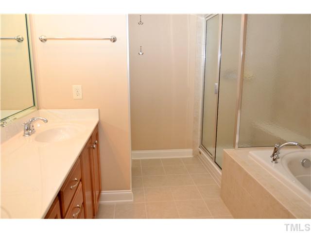 3517 Stonebend Loop Cary, NC 27518 - Photo 12 of 21 a bathroom with a sink and a bathtub