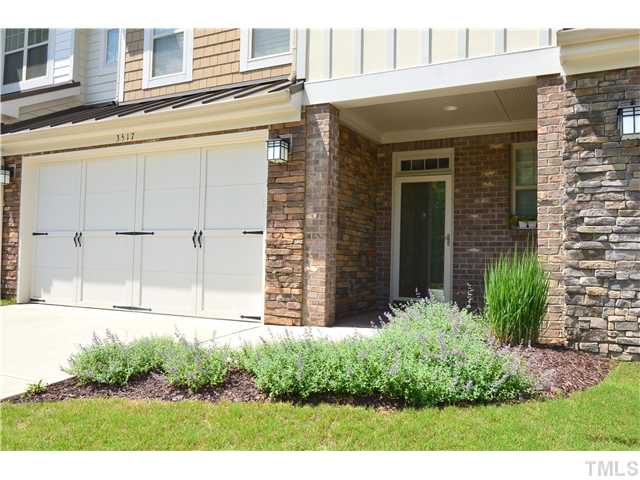 3517 Stonebend Loop Cary, NC 27518 - Photo 2 of 21 a view of a house with a yard and potted plants